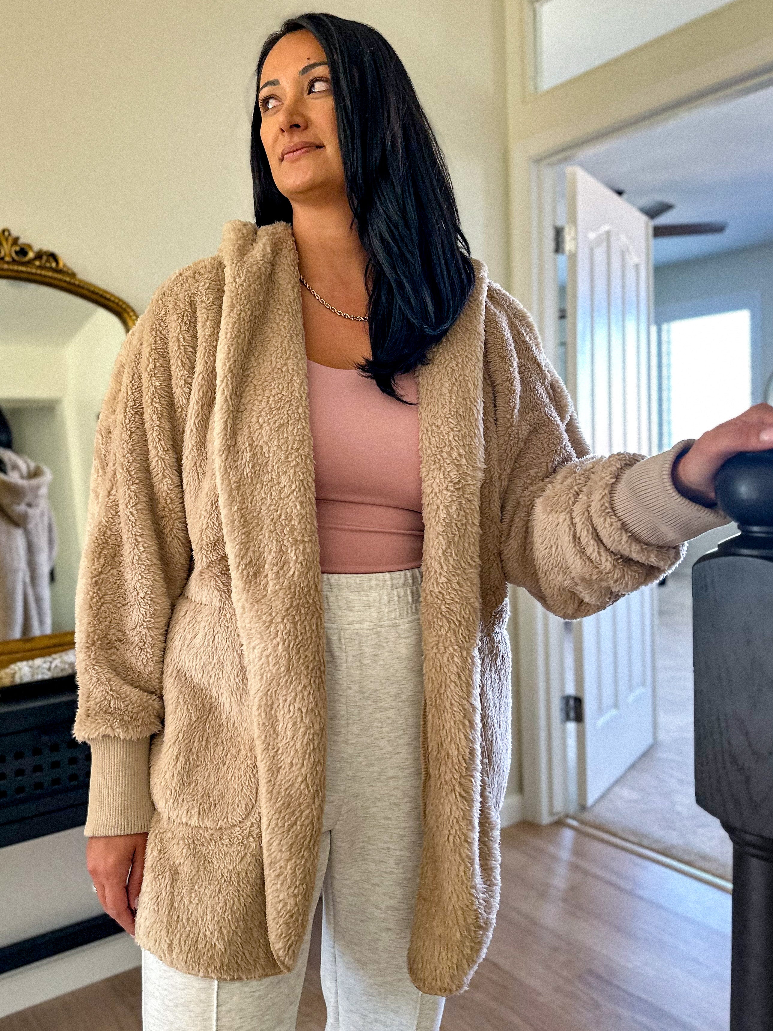 women's beige teddy bear soft, cozy, and fuzzy longer robe jacket with a hood