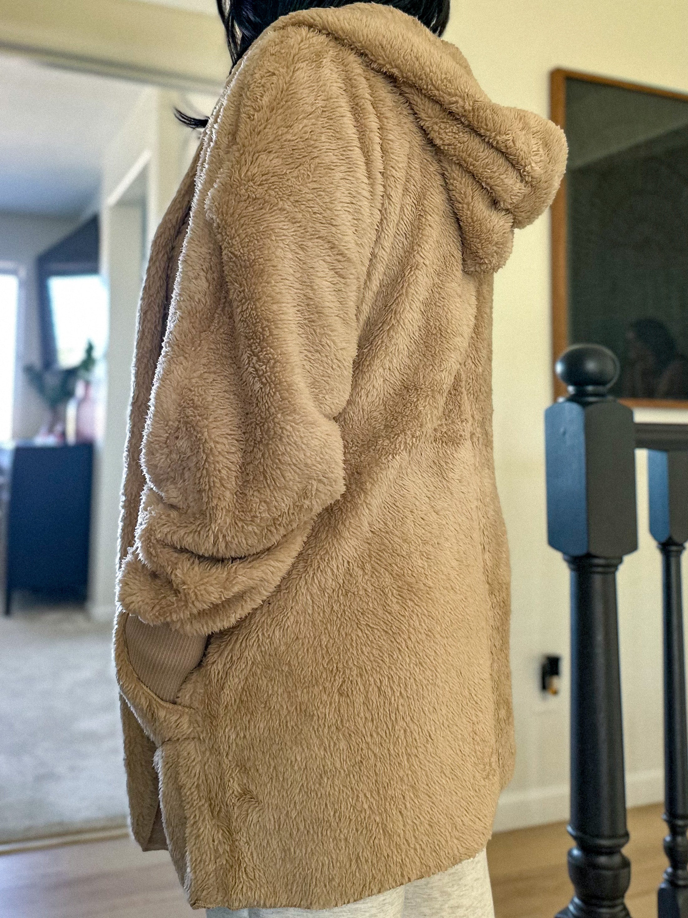 women's beige teddy bear soft, cozy, and fuzzy longer robe jacket with a hood