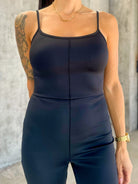 Women's black buttery soft stretchy athletic jumpsuit with adjustable straps