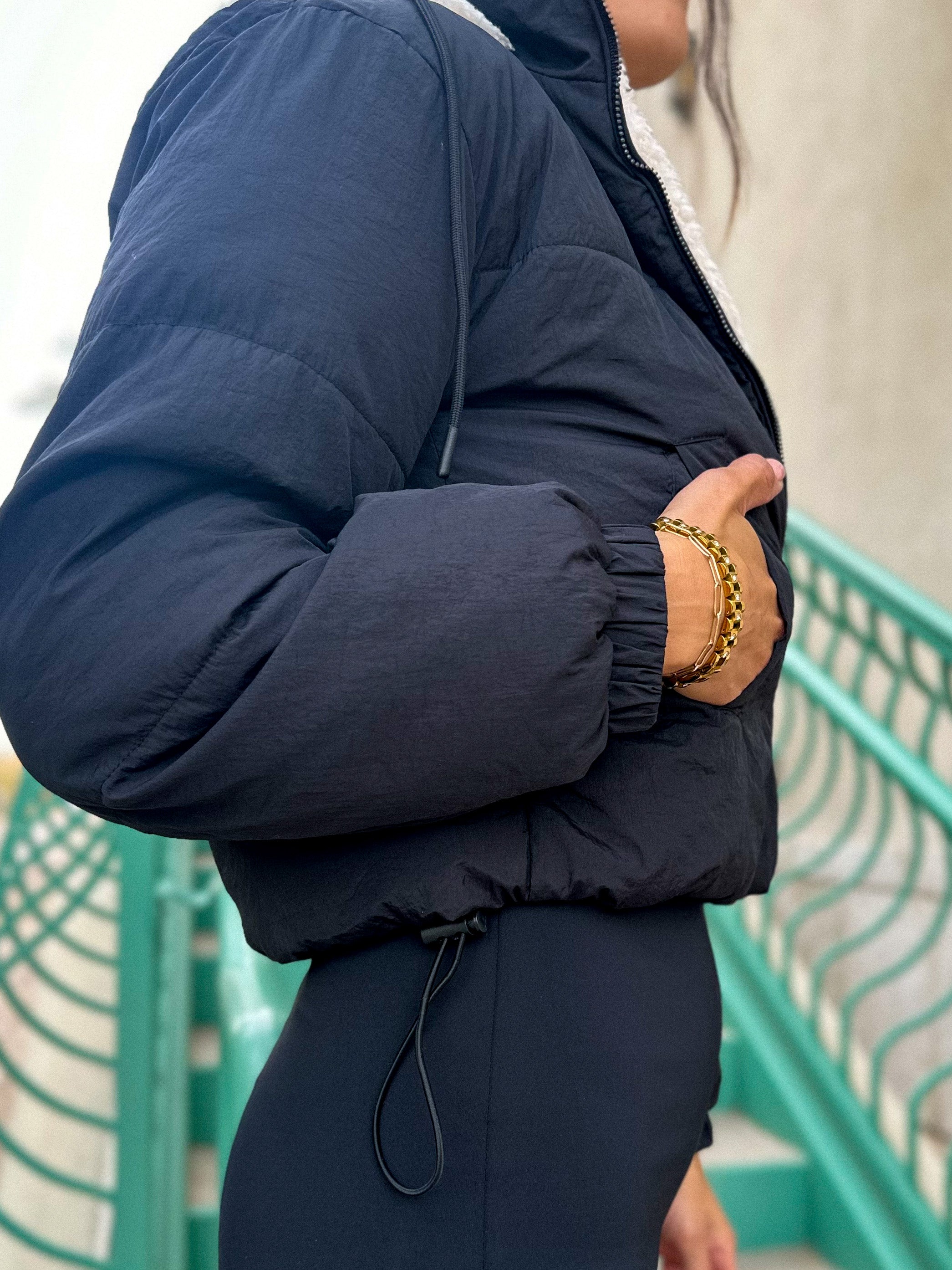 Women's black reversible soft sherpa down puffer crop jacket