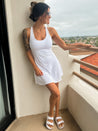 comfortable buttery soft white active romper dress with built in shorts