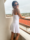comfortable buttery soft white active romper dress with built in shorts
