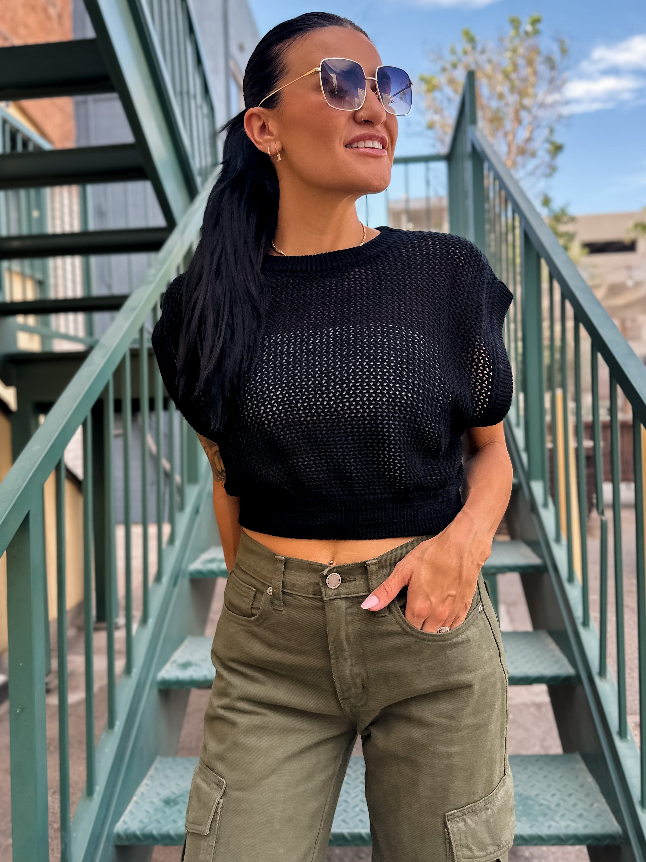 black openwork crochet crop top