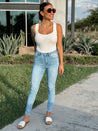white ribbed knit bodysuit