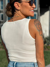white ribbed knit bodysuit