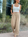 white ribbed knit bodysuit with wide leg pants for work office