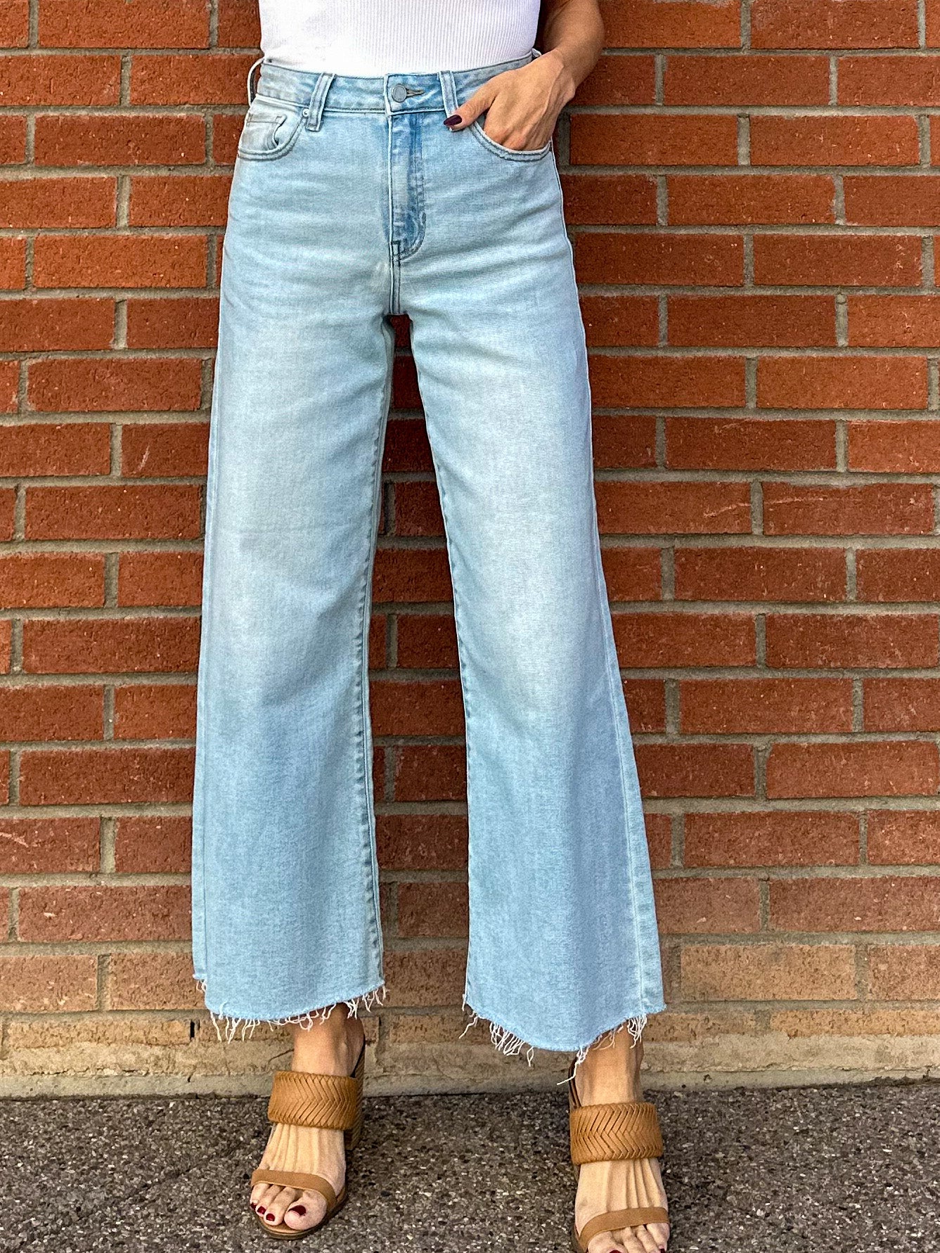 JBD just black denim slim wide leg jeans in a light wash denim with raw hem