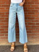 JBD just black denim slim wide leg jeans in a light wash denim with raw hem
