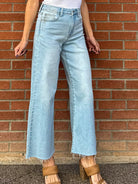 JBD just black denim slim wide leg jeans in a light wash denim with raw hem