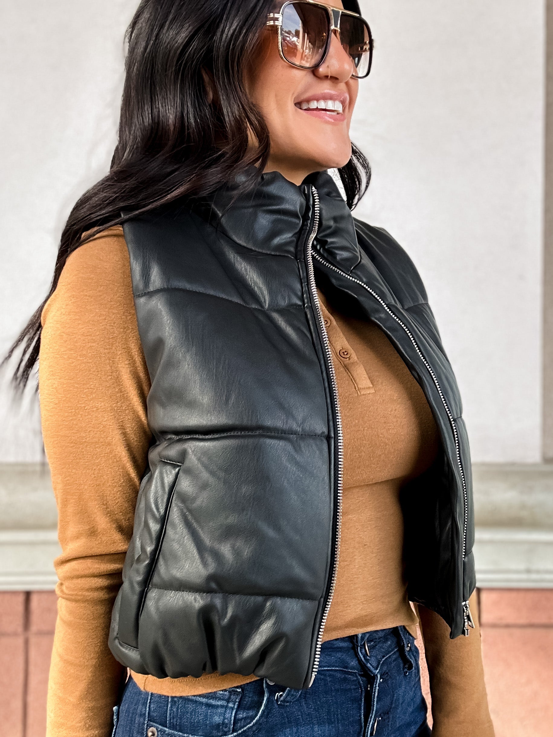 black vegan leather puffer vest with zipper