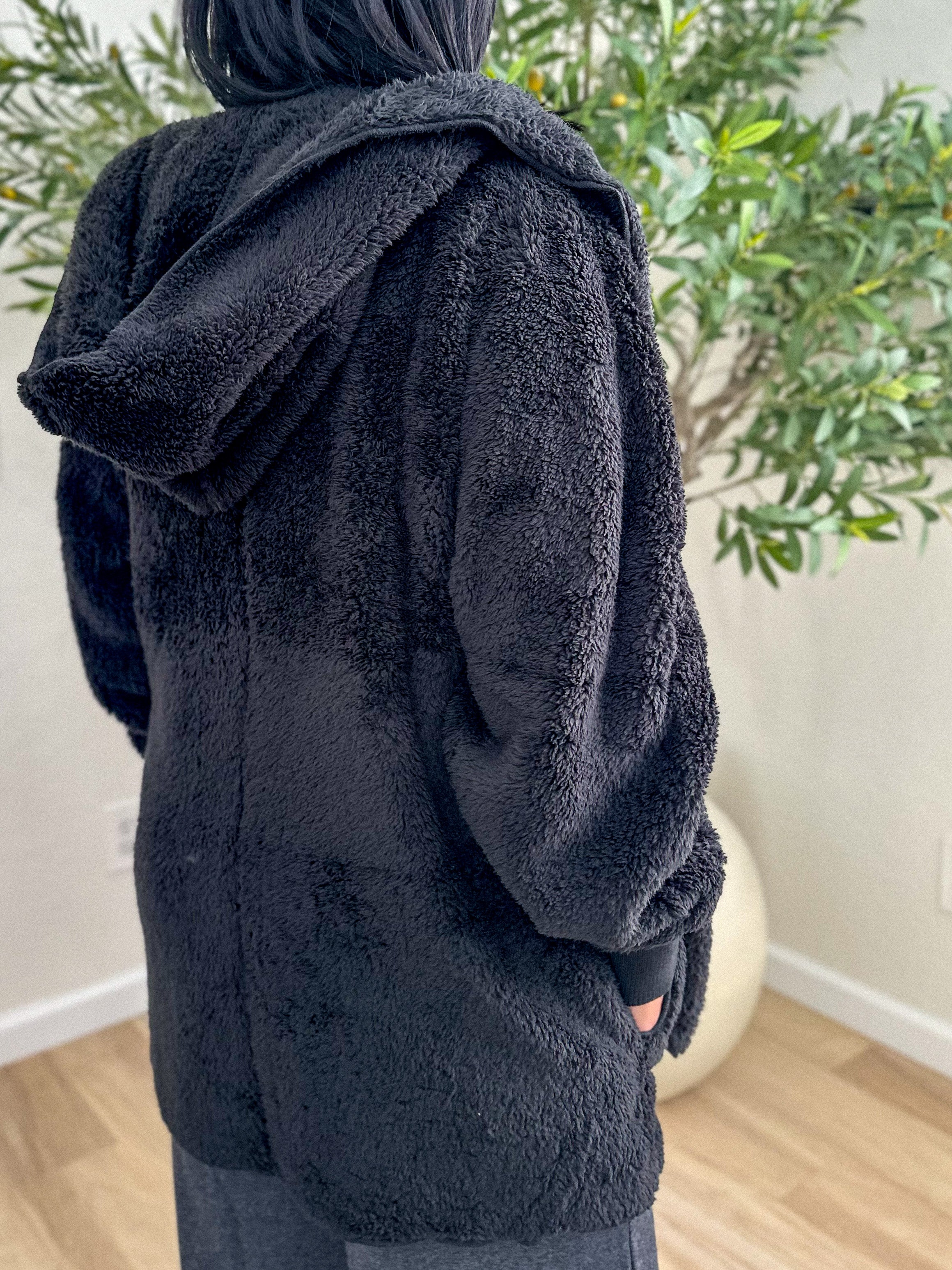 women's oversized teddy bear black soft, cozy, and fuzzy longer robe jacket with a hood