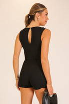 Black romper mini dress with shorts and a square neckline